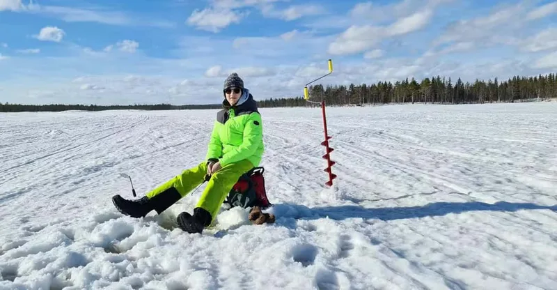 Snowmobile and Ice Fishing Safari with Campfire Snacks — snowmobile tour in Levi