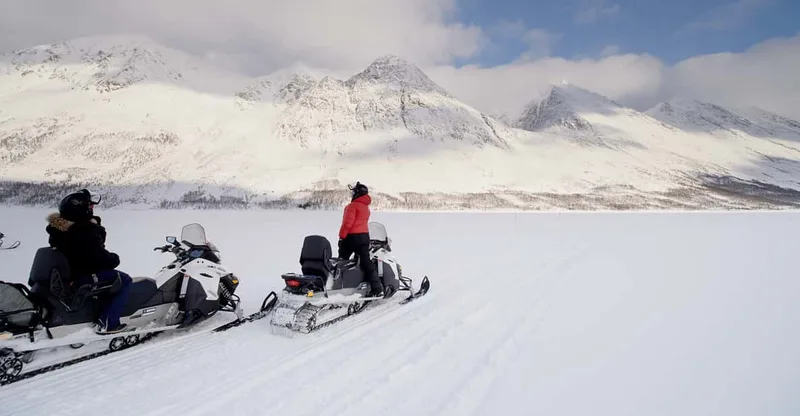 Scenic Arctic snowmobile safari in the Lyngen Alps — snowmobile tour in Tromsø